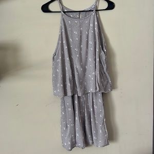 Ces Femme purple swing romper white daisy pattern. Size small.